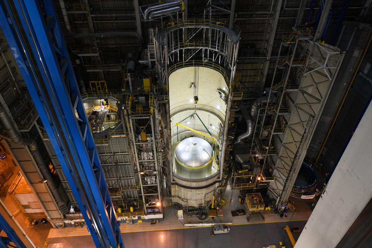 This image shows the latest progress NASA has made in manufacturing the liquid oxygen tank for the second core stage of NASA’s Space Launch System (SLS) rocket. The liquid oxygen tank will be used for the first crewed mission, Artemis II, of the agency’s Artemis program. Teams at NASA’s Michoud Assembly Facility in New Orleans recently completed internal cleaning of the liquid oxygen, or LOX, tank at the facility. Following the cleaning, crews prepared the propellant tank for the next phase of phase of assembly in a different area of the factory by moving, or breaking over, the tank from a vertical to horizontal position. The LOX tank is one of five major elements that make up the rocket’s massive 212-foot-tall core stage. The propellant tank holds 196,000 gallons of supercooled liquid oxygen to help fuel four RS-25 engines, and the internal cleaning ensures no contaminants make their way into the complex propulsion and engine systems of the deep space rocket. The stage, which includes a cluster of four RS-25, will produce more than 2 million pounds of thrust to help launch the SLS rocket and astronauts aboard NASA’s Orion spacecraft around the Moon for Artemis II.   NASA is working to land the first woman and the next man on the Moon by 2024. The agency’s SLS rocket offers more payload mass, volume capability and energy to speed missions through deep space and enable NASA’s Artemis lunar program. SLS, along with Orion, the human landing system, and the Gateway in orbit around the Moon are NASA’s backbone for deep space exploration. No other rocket is capable of carrying astronauts in Orion around the Moon in a single mission.